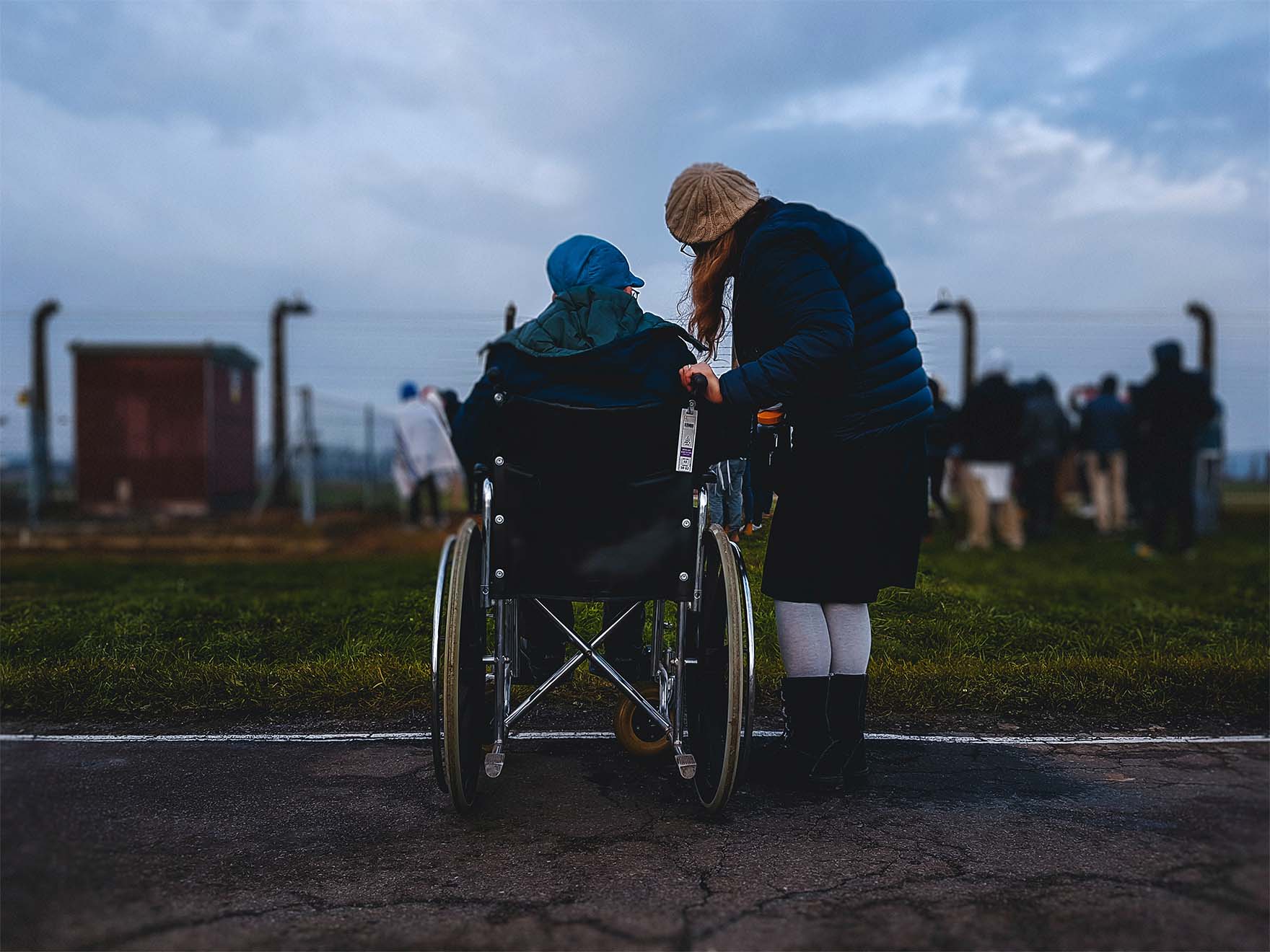 resident and carer on a walk