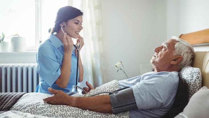 Nurse caring for resident