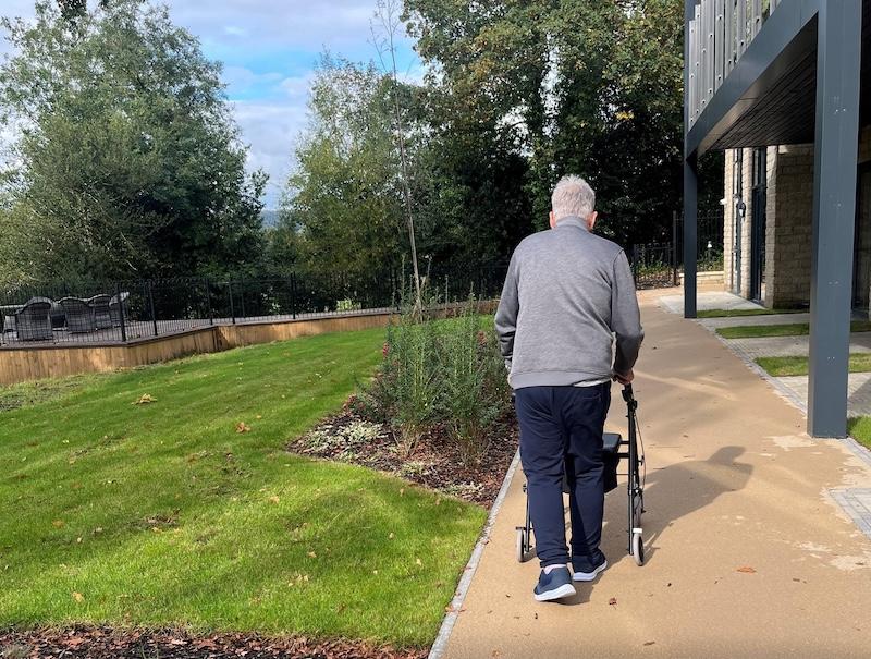 resident walking around the garden