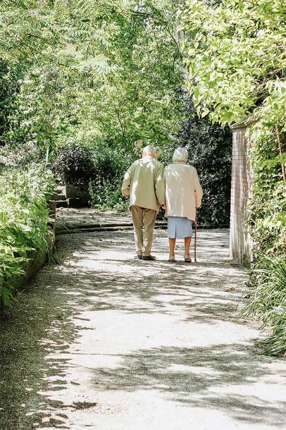 Couple walking along a path