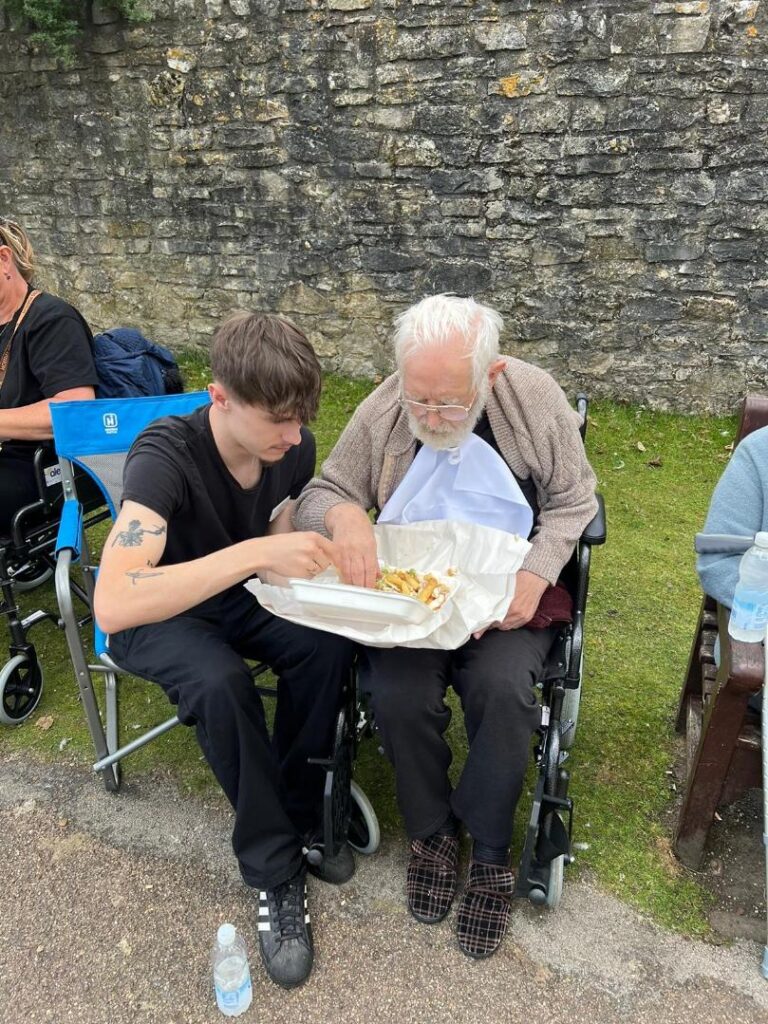 Resident enjoying fish and chips