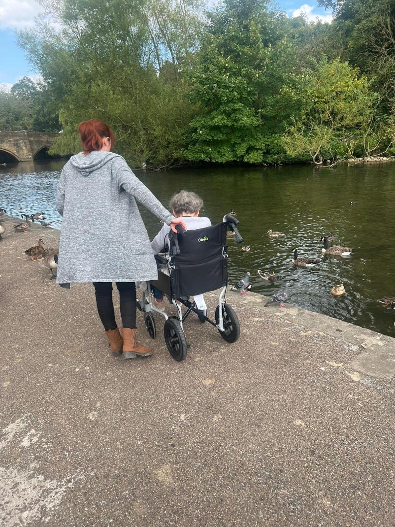 resident looking at the ducks