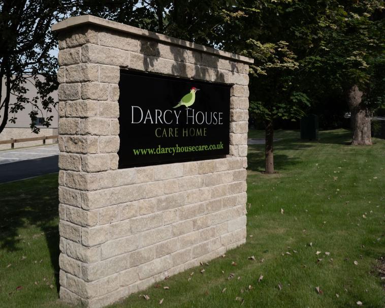 Darcy House sign