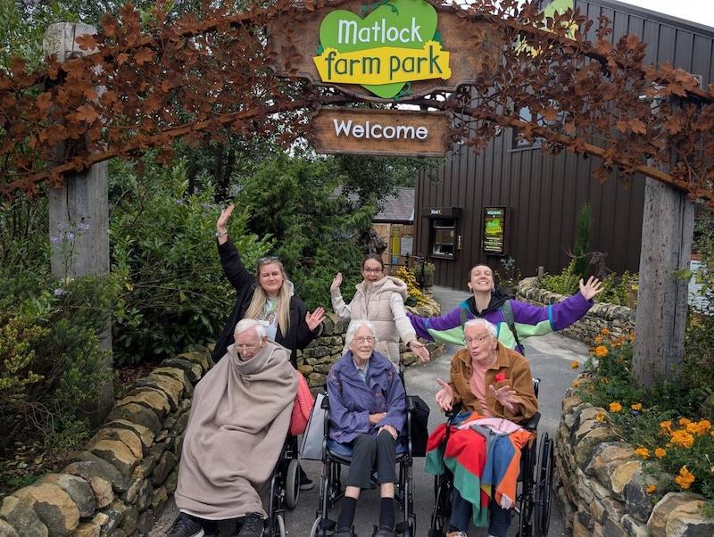 a group photo of our residents and carers at Matlock farm park