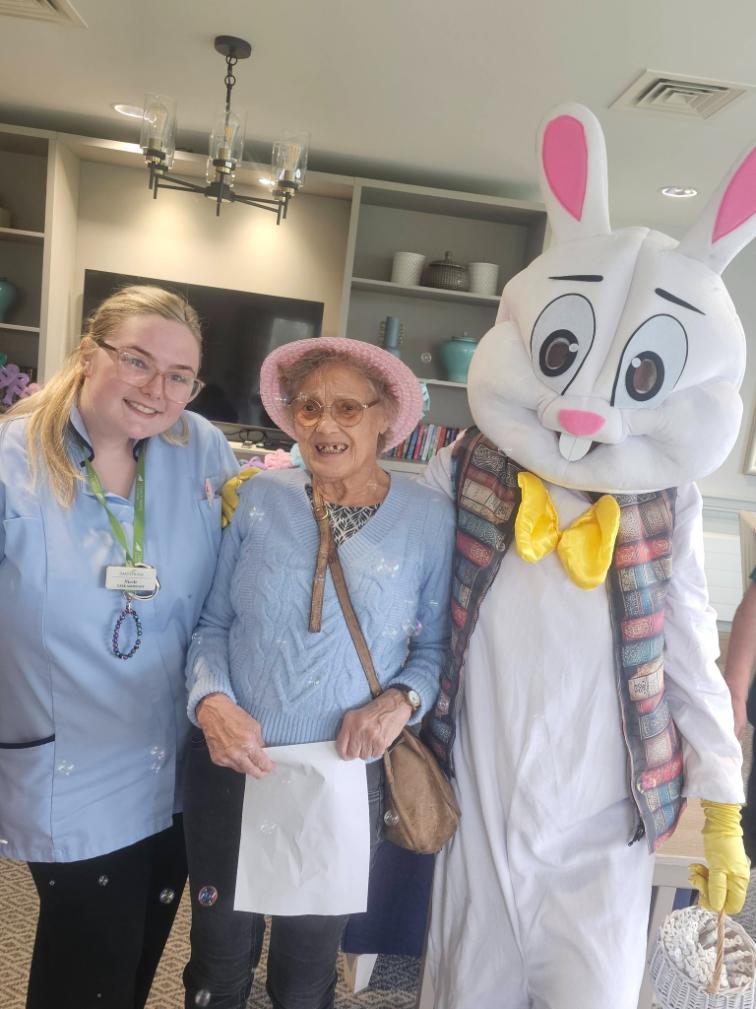 easter rabbit with an older lady and a health care assistant