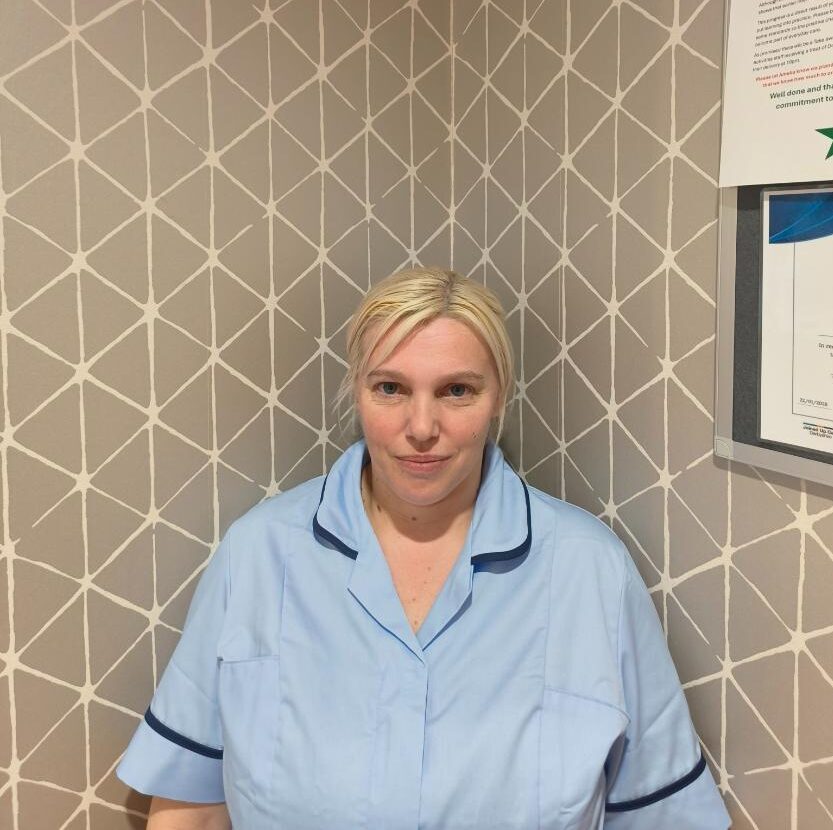 lady smiling for staff photo