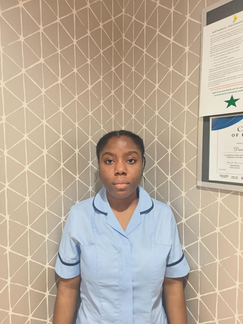 lady posing for staff photo