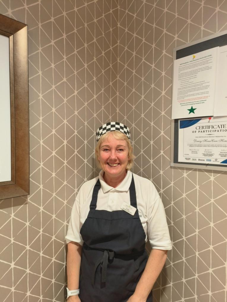 lady smiling for staff photo
