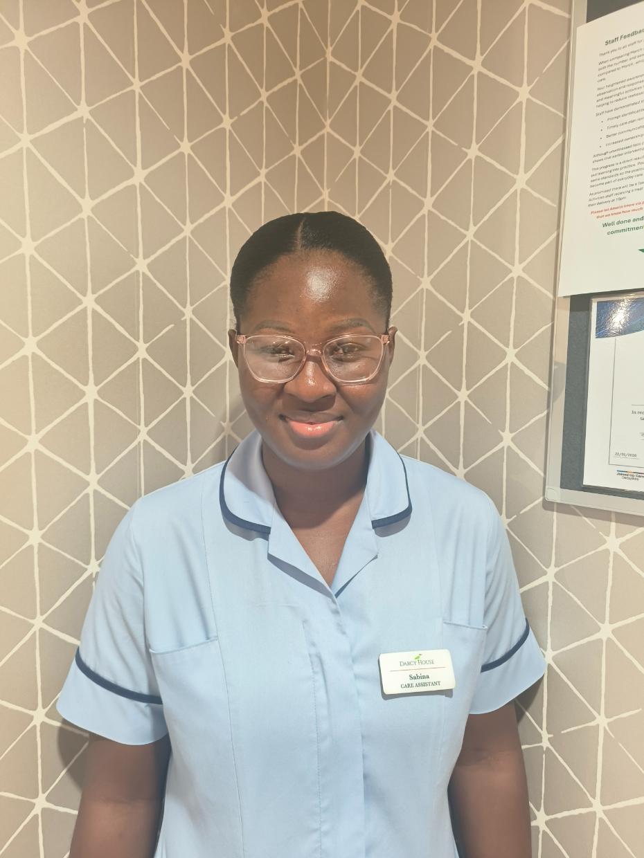 lady smiling for staff photo