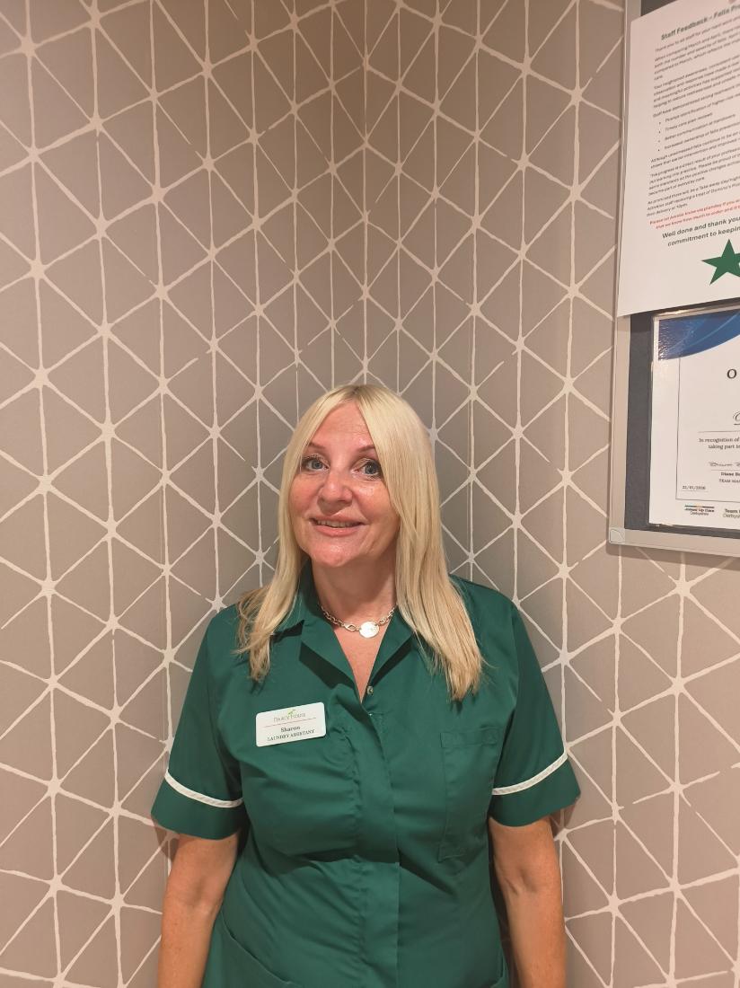 lady smiling for staff photo