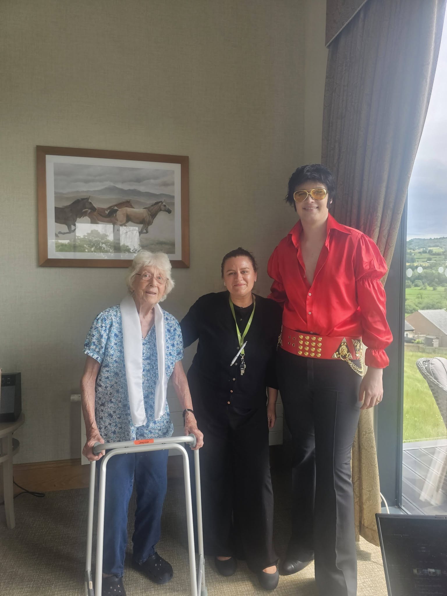 two older ladies with an elvis impersonator