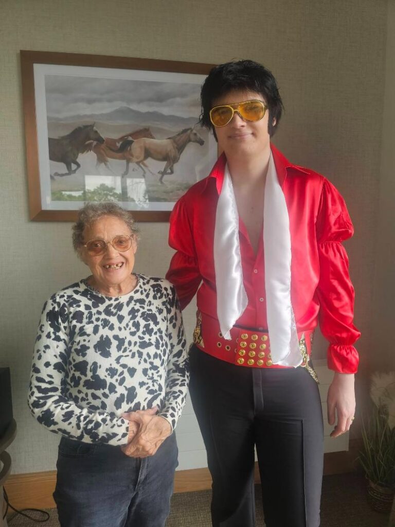 older lady with an elvis impersonator